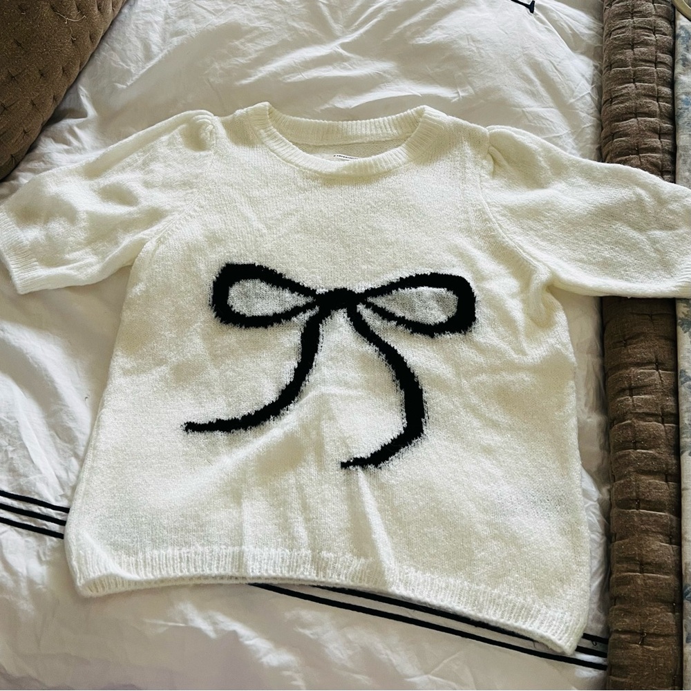 Anthropologie Cream Sweater with Black Bow